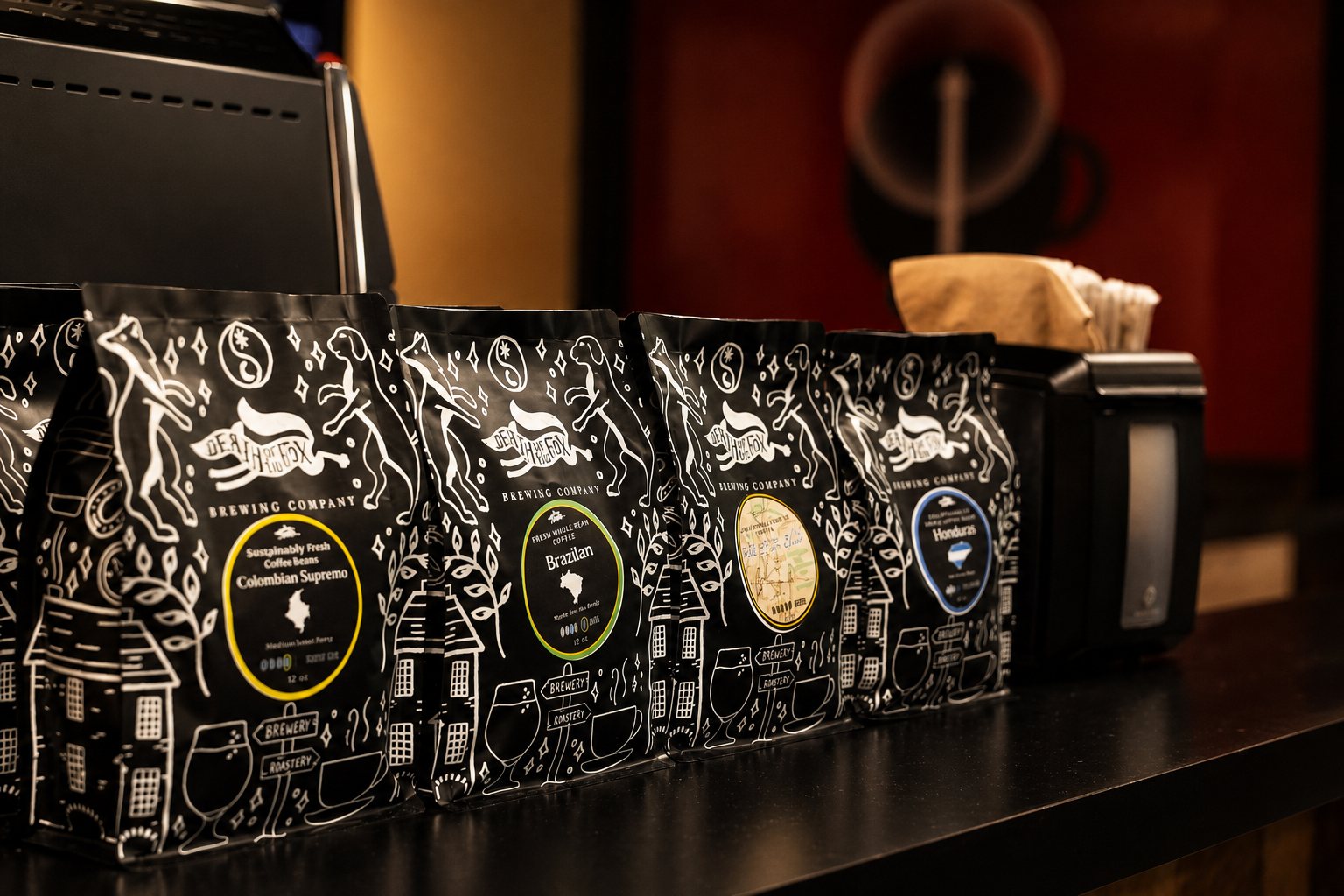 Lineup of High Grounds coffee bags on the counter