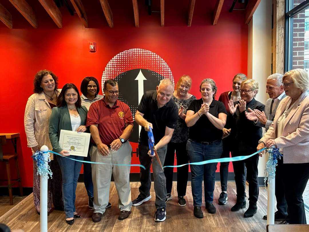 Ribbon-cutting ceremony at High Grounds Glassboro in 2023