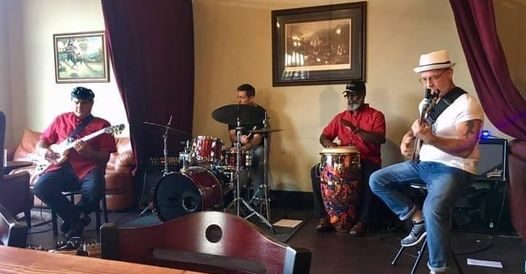 Live band playing in the Death of the Fox tasting room