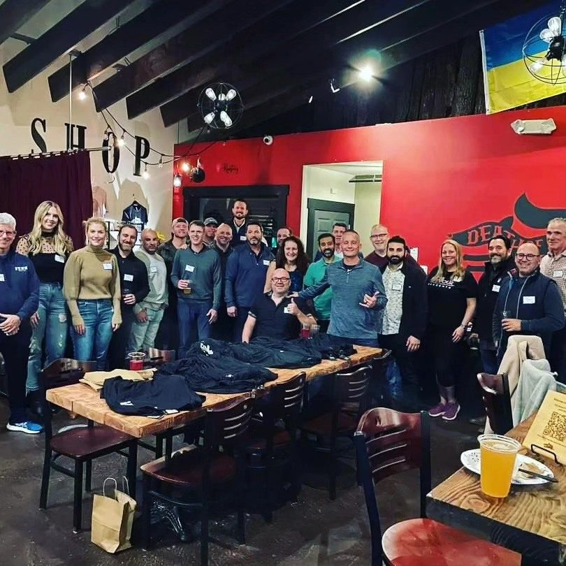 Large group gathered for a private event in the Death of the Fox tasting room